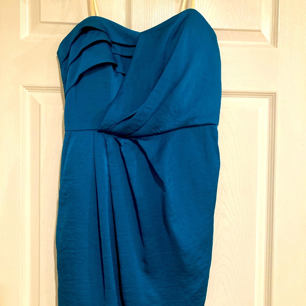 BCBG strapless mini cocktail dress with pockets. Size 8. New.